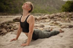 This lady is practacing Pilates in the sand, showing you that Pilates can be practaced almost anwer with or without the need for Pilates Machines