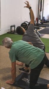 This shows an older man doing Pilates - We will be covering over 50s, over 60's and Pilates for the Elderly in our Pilates Blog
